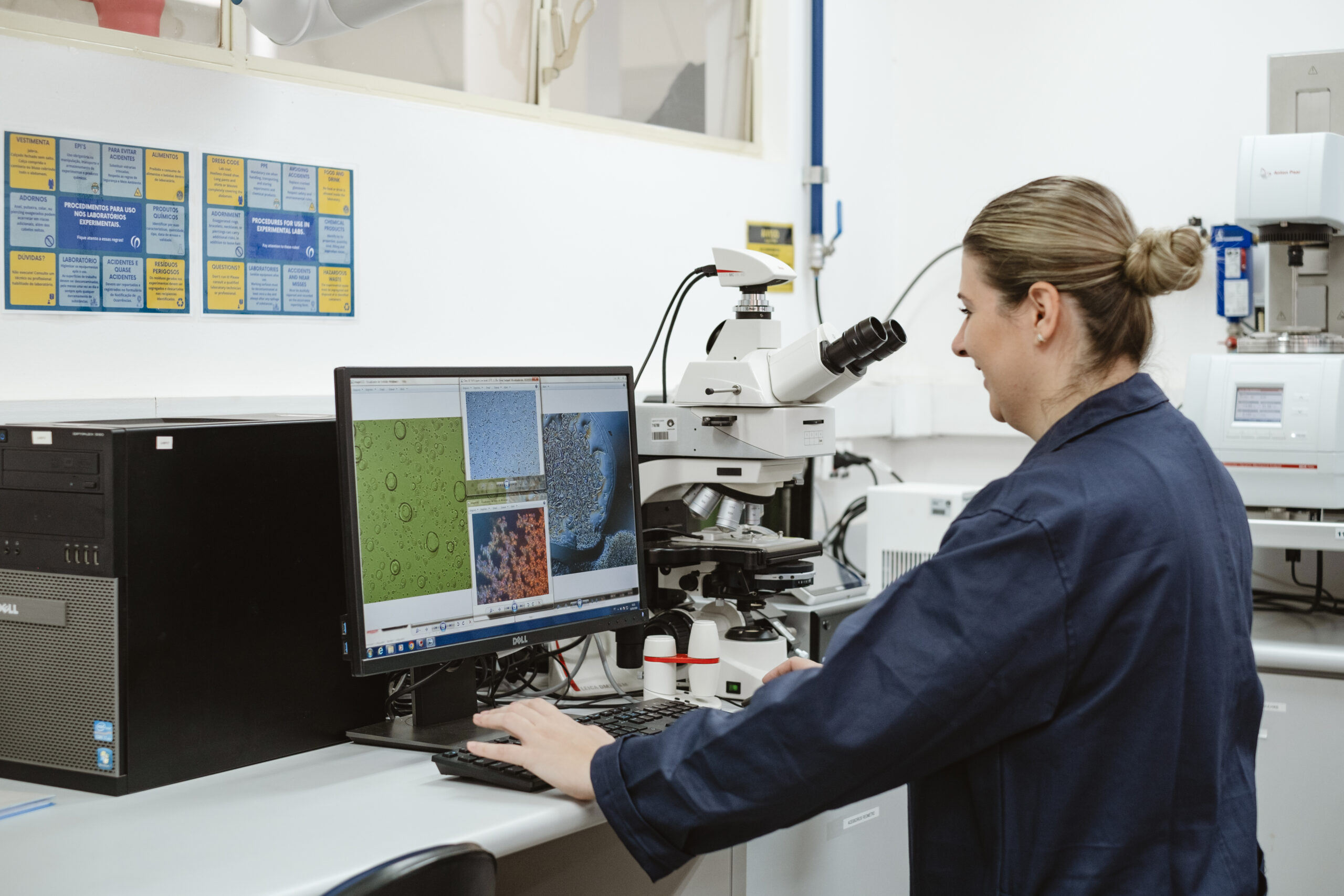 Researcher working on a microscope